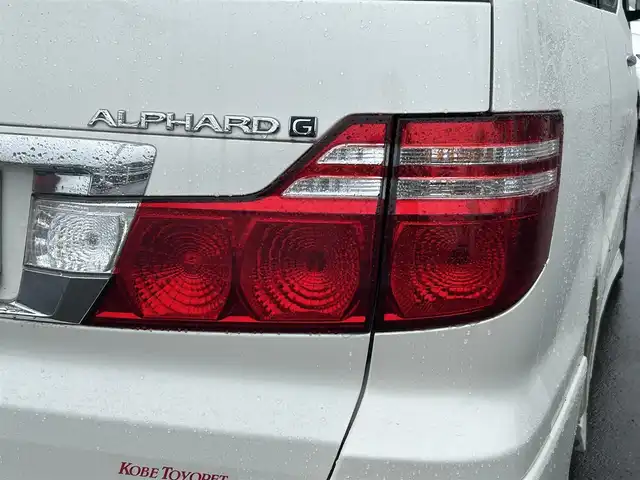 トヨタ アルファード Ｇ AX Lエディション 和歌山県 2005(平17)年 14.7万km 白 純正ナビ/バックカメラ/片側パワースライドドア/コーナーセンサー/ウッドコンビ/ステアリングリモコン/HID/ETC/電動格納ミラー/オートライト/マット/バイザー/シートカバー/純正アルミホイール/キーレス