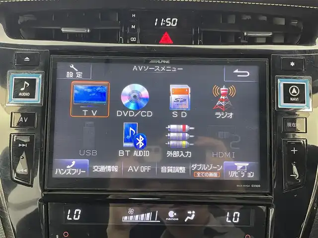 トヨタ ハリアー プレミアム 大分県 2014(平26)年 9.3万km ホワイトパールクリスタルシャイン 社外9型ナビ/（CD/DVD/SD/BT/フルセグ）/社外9型フリップダウンモニター　PCH-RM955/バックカメラ/Toyota　Safety　Sense/・プリクラッシュセーフティ/・レーンディパーチャーアラート/・アダプティブハイビームシステム/・レーダークルーズコントロール/プッシュスタート/スマートキー2本/電動リアゲート/パワーシート/コーナーセンサー/ステアリングリモコン/電動ウィンカーミラー/ステアリングリモコン/フォグランプ