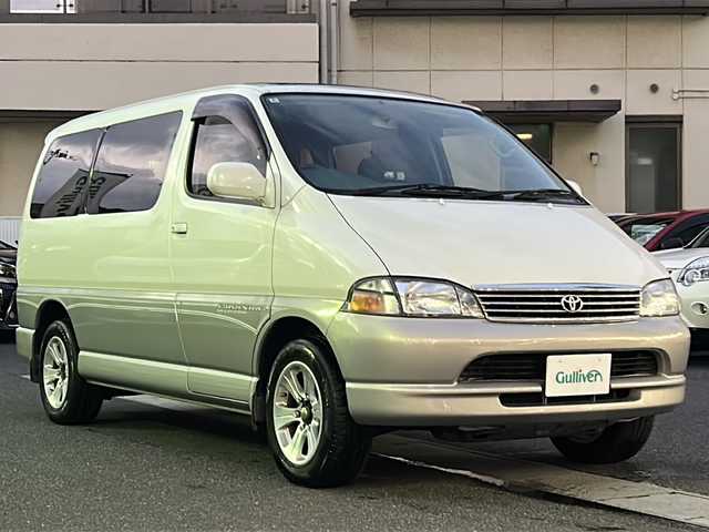 トヨタ グランビア G クルージングセレクション 岡山県 1998(平10)年 16.4万km ホワイトパールマイカ/ライトグレイッシュローズMP 登録時走行距離163982km/社外後席モニター/サンルーフ/社外SDナビ/(AM/FM/BT/TV/DISC)/バックカメラ/ETC/電動格納ミラー/リモコンキー/社外16インチアルミホイール/キセノンヘッドライト/パワーステアリング/パワーウィンドウ