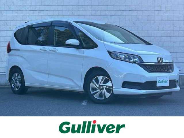 ホンダ フリード ハイブリット G 大阪府 2022(令4)年 3.2万km プラチナホワイトパール ナビ　/フルセグ　/Ｂｌｕｅｔｏｏｔｈ　/バックカメラ　/両側パワースライドドア　/シートヒーター　/レーダークルーズコントロール　/ＬＥＤヘッドライト　/スマートキー　/ＥＴＣ　/フロアーマット　/バイザー/パーキングセンサー
