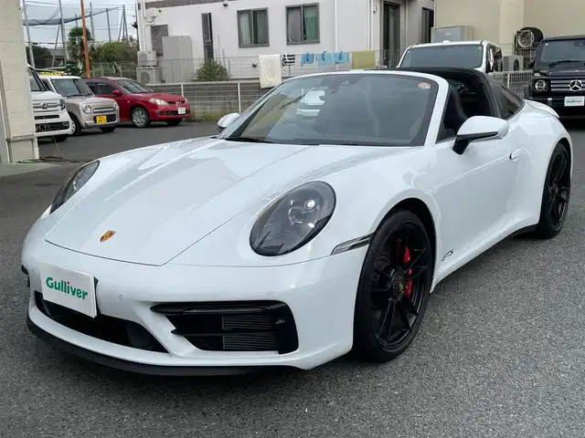 ポルシェ ポルシェ ９１１ タルガ4 GTS 神奈川県 2022(令4)年 1.3万km キャララホワイトメタリック 赤ソフトトップ/黒革シート/スポーツクロノ/スポーツエグゾースト/PASM/純正20/21インチAW/電動スポイラー/LEDヘッドライト/純正メモリーナビ/AppleCarPlay/AndroidAuto/純正USB/BT/360°カメラ/ETC2.0/ドライブレコーダー/シートヒーター/エアシート/クルーズコントロール/衝突軽減ブレーキ/BSM/コーナーセンサー/パドルシフト/アイドリングストップ/スマートキー/R5/6/7年ディーラー整備記録