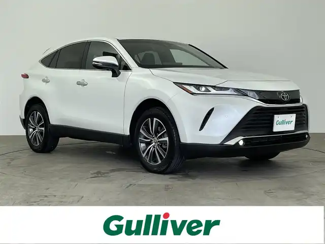 トヨタ ハリアー G 大分県 2022(令4)年 1.3万km プラチナホワイトパールマイカ 禁煙車/純正ディスプレイオーディオ/（USB/Bluetooth/Miracast/フルセグTV）/バックカメラ/プリクラッシュセーフティー/クリアランスソナー/ブラインドスポットモニター/リアクロストラフィックアラート/レーントレーシングアシスト/ロードサインアシスト/ふらつき警報/先行車発進告知/パワーバックドア/革巻きステアリング/レーダークルーズコントロール/ステアリングスイッチ/LEDヘッドライト/フォグランプ/オートヘッドライト/オートマチックハイビーム/ハーフレザーシート/D席パワーシート/ミラー型ドライブレコーダー/電動パーキングブレーキ/オートホールドブレーキ/USB充電/純正アルミホイール/純正フロアマット