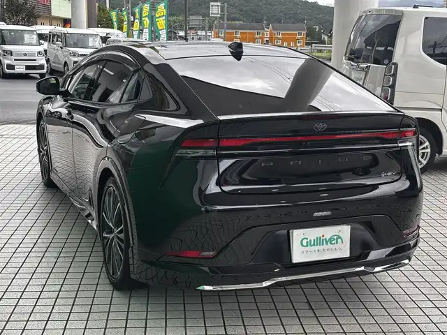 トヨタ プリウス Z 京都府 2023(令5)年 3.3万km アティチュードブラックマイカ モデリスタエアロ/パノラマルーフ/純正12.3インチメモリーナビ、地デジ、Bluetooth/パノラミッックビューモニター/トヨタセーフティセンス/・プリクラッシュセーフティ/・レーントレーシングアシスト/・レーダークルーズコントロール/・ロードサインアシスト/・レーンディバーチャーアラート/・オートマチックハイビーム/黒革シート（運転席パワーシート/メモリーシート）/前席エアーシート/シートヒーター/ハンドルヒーター/パワーバックドア/USB端子/パーキングアシスト/デジタルインナーミラー/ビルトイン2.0ETC/スペアキー