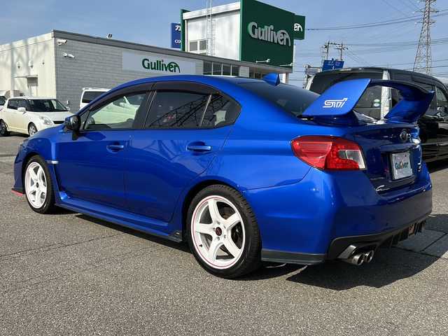 スバル ＷＲＸ ＳＴＩ STI 石川県 2014(平26)年 10.9万km WRブルーパール ４ＷＤ　/IC付ターボ /リア/サイドエアロ /バックカメラ　/ナビ（ＣＤ／ＤＶＤ／ＢＴ／フルセグＴＶ）　/オートライト　/横滑り防止装置　/ＥＴＣ　/ハーフレザーシート /プッシュスタート /スマートキー /ドラレコ/社外18インチアルミホイール