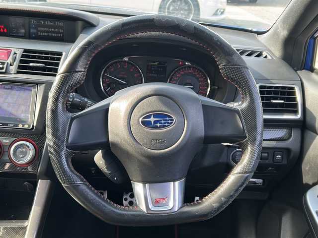 スバル ＷＲＸ ＳＴＩ STI 石川県 2014(平26)年 10.9万km WRブルーパール ４ＷＤ　/IC付ターボ /リア/サイドエアロ /バックカメラ　/ナビ（ＣＤ／ＤＶＤ／ＢＴ／フルセグＴＶ）　/オートライト　/横滑り防止装置　/ＥＴＣ　/ハーフレザーシート /プッシュスタート /スマートキー /ドラレコ/社外18インチアルミホイール