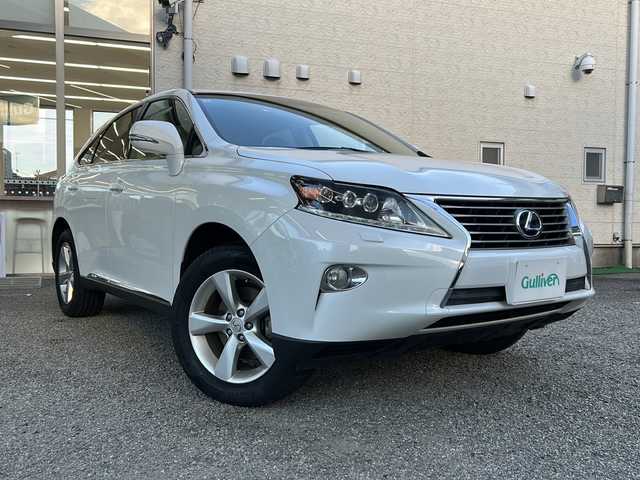 レクサス ＲＸ 450h 兵庫県 2012(平24)年 8.5万km ホワイトパールクリスタルシャイン 純正HDDナビ/Bluetooth・AM/FM・CD・DVD・USB・AUX/車外カメラ（バック+サイド）/フルセグTV/ヘッドアップディスプレイ/クルーズコントロール/パワーバックドア/パワーシート（D+N席）/アンチロック・ブレーキ・システム/衝突被害軽減システム/横滑り防止装置/盗難防止装置/エアバッグ（W+サイド）/カーテンエアバッグ/純正フロアマット/純正アルミホイール/LEDヘッドライト/プッシュスタート/スマートキー/スペアキー×2/取扱説明書/保証書