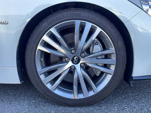 日産 スカイライン ハイブリッド 350GT Type SP 岐阜県 2018(平30)年 4.3万km ブリリアントホワイトパール 禁煙車/純正ナビ/フルセグTV/クルーズコントロール/アラウンドビューモニター/前後コーナーセンサー/衝突軽減ブレーキ/サンルーフ/BOSEスピーカー/シートヒーター/レザーシート/パワーシート/シートメモリー/ドライブレコーダー/ビルトインETC/パドルシフト/カーテンエアバッグ/純正アルミホイール/純正フロアマット/オートライト/オートハイビーム/プッシュスタート/スマートキー/スペアキー