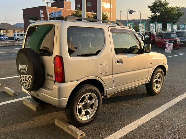 スズキ ジムニー XC 京都府 1998(平10)年 14.3万km シルキーシルバーメタリック ドアバイザー/4WD/フォグランプ