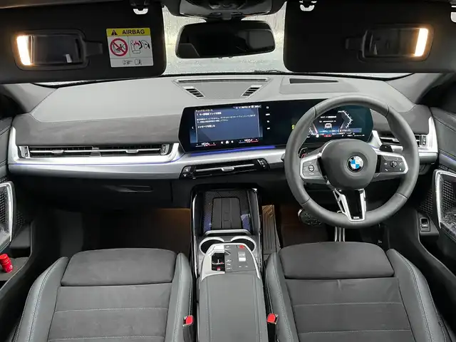 ＢＭＷ ＢＭＷ Ｘ２ xDrive 20i Mスポーツ 青森県 2025(令7)年 0.3万km グレー ４WD/カラーコードC4W　スカイクレイパーグレー/純正ナビ/（Bluetooth・USB・AppleCarPlay・AndroidAuto）/パーキングアシスト/アダプティブLEDヘッドライト/レインセンサー/ハンズオフアシスト/ステアリング・レーンコントロールアシスト/アダプティブクルーズコントロール/レーンキープアシスト/レーンチェンジアシスト/前車接近警告/後車衝突警告/インテリアカメラ/全方位カメラ/バーチャルコックピット/ヘッドアップディスプレイ/ダウンヒルアシスト/ワイヤレス充電/ハーフレザーシート/メモリー付パワーシート（D席）/前席シートヒーター/ステアリングスイッチ/パドルシフト/電動バックドア/コーナーセンサー/ウインカーミラー/エアバックW・サイド・カーテン/ABS/横滑り防止機能/盗難防止センサー/プッシュスタート/スマートキーX2/取扱説明書/保証書