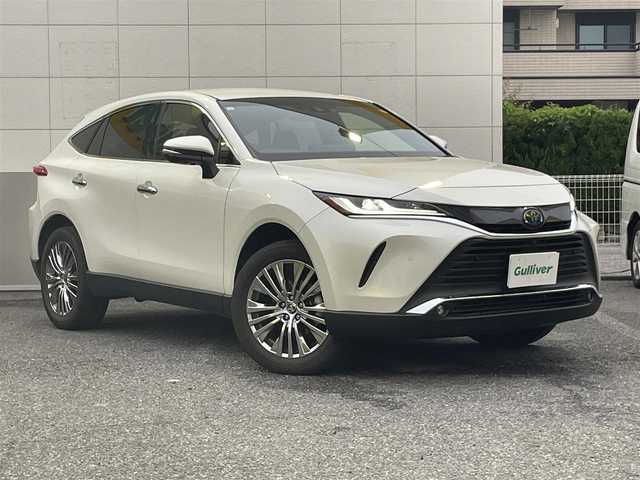 トヨタ ハリアー ハイブリッド Z 福岡県 2021(令3)年 3.9万km ホワイトパールクリスタルシャイン ワンオーナー/純正12.3ディスプレイオーディオ/フルセグTV/Bluetooth/Miracast/AM/FM/JBLサウンド/Toyota Safety Sense/・プリクラッシュセーフティ/・オートマチックハイビーム/・ロードサインアシスト/・先行車発進告知機能/・レーダークルーズコントロール/・レーントレーシングアシスト/・パノラミックビューモニター/・シースルービュー/・パーキングサポートブレーキ/・ドライブスタートコントロール/・ブラインドスポットモニター/デジタルインナーミラー/純正ビルトインETC 2.0/革巻きステアリング/ステアリングチルド機構（電動）/プッシュスタート/スマートキー（スペアキー１本）/ドライブレコーダー/LEDヘッドライト/LEDフォグランプ/オートライト/ウィンカーミラー/電動格納式ミラー/純正19インチアルミホイール/純正フロアマット/ドアバイザー
