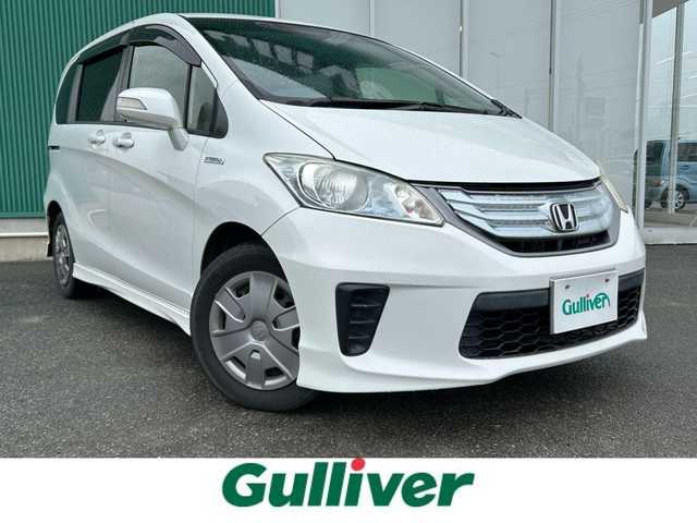 ホンダ フリード ハイブリット ジャストセレクション 福岡県 2013(平25)年 14.1万km ホワイトオーキッドパール パワーステアリング/スマートキー/フルセグTV/純正ETC/バックカメラ/両側パワースライドドア/LEDライト/HONDAスマートキーシステム