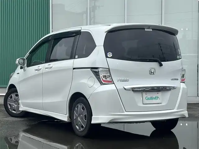 ホンダ フリード ハイブリット ジャストセレクション 福岡県 2013(平25)年 14.1万km ホワイトオーキッドパール パワーステアリング/スマートキー/フルセグTV/純正ETC/バックカメラ/両側パワースライドドア/LEDライト/HONDAスマートキーシステム