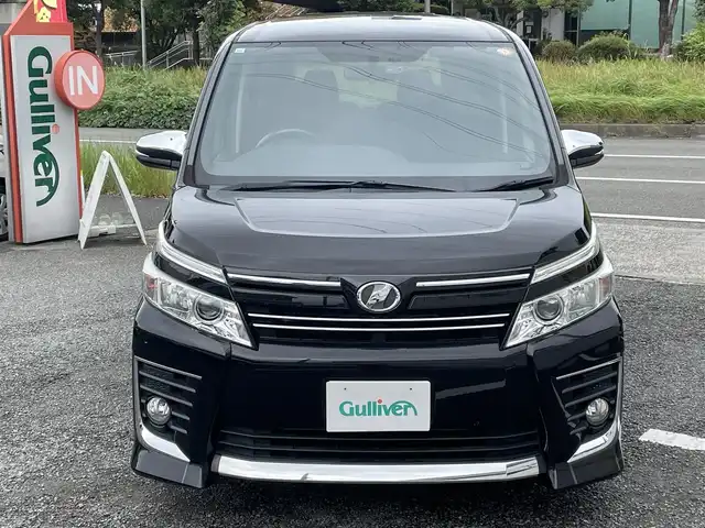 トヨタ ヴォクシー ZS 煌 道南・函館 2015(平27)年 5.3万km ブラック ワンオーナー/ディーラーop 9インチSDナビ/・フルセグTV/CD/DVD/BT/SD REC/純正フリップダウンモニター/バックカメラ/ビルトインETC2.0/前後ドライブレコーダー/両側パワースライドドア/アイドリングストップ機能/スマートキー/純正16インチAW/LEDヘッドライト/フォグランプ/横滑り防止装置/ドアバイザー/純正フロアマット/保証書/取扱説明書/スペアキー×１
