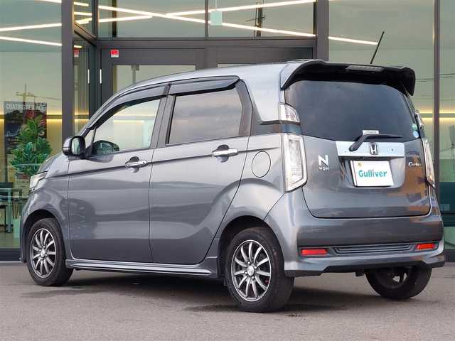ホンダ Ｎ ＷＧＮ カスタム G ターボパッケージ 東京都 2015(平27)年 14.9万km ポリッシュドメタルメタリック KENWOOD製メモリナビ(MDV-Z701)/・Bluetooth/フルセグTV/CD/DVD/バックカメラ/純正１４インチAW/ハーフレザーシート/ECON/クルーズコントロール/パドルシフト/純正フロアマット/ドアバイザー/HIDオートライト/プッシュスタート/スマートキー/取扱説明書/保証書