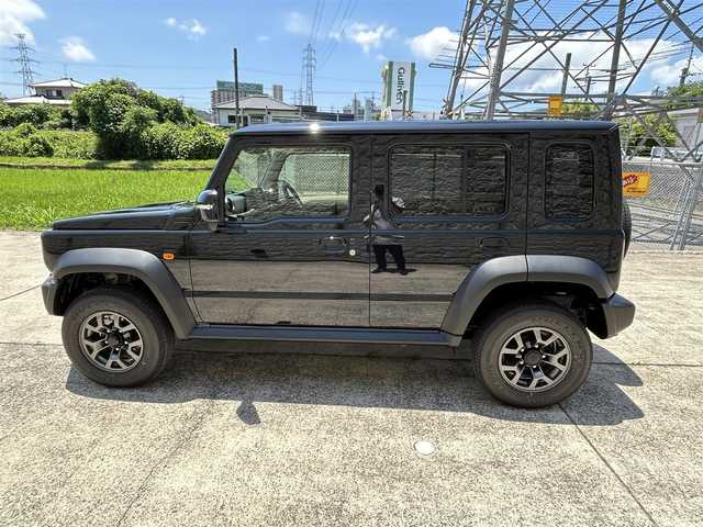 スズキ ジムニー ノマド FC 長崎県 2025(令7)年 0.1万km未満 黒 ワンオーナー/アダプティブクルーズコントロール/デュアルカメラブレーキサポート/車線逸脱警報/ハイビームアシスト/LEDヘッドライト/オートライト/純正15インチアルミホイール/シートヒーター/コーナーセンサー/横滑り防止機能/スマートキー/スペアキー×1/保証書　取扱説明書