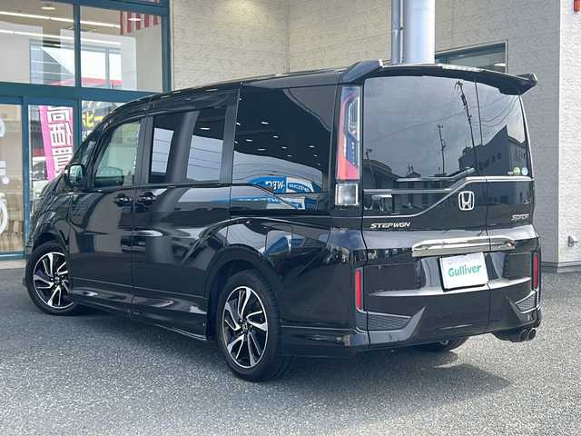 ホンダ ステップワゴン スパーダ クルスピセンシング 愛知県 2018(平30)年 6.9万km プレミアムスパークルブラックパール 登録時走行距離68994km/ワンオーナー/社外7インチメモリナビ/(Bluetooth/フルセグTV/DVD)/ALPINE10.1インチフリップダウンモニター/無限フルエアロ/無限フロアマット/無限ドアバイザー/無限マフラー/ホンダセンシング/衝突軽減ブレーキ/レーンキープアシスト/先行車発進告知/ロードサインアシスト/アダプティブクルーズコントロール/誤発信抑制機能/両側パワスラ/ワクワクゲートバックドア/前席シートヒーター/ビルドインETC/パドルシフト/左側サイドアンダーミラー/スマートキー/(スペアキー×1)/取説/保証書