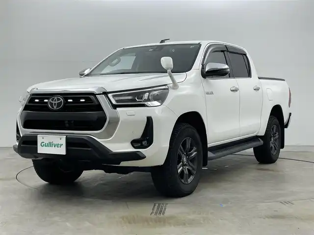 トヨタ ハイラックス Z 岡山県 2021(令3)年 5.1万km スーパーホワイトⅡ 純正ナビ　(NSZT-Y68T)/【CD/DVD/BT/SD/フルセグ】/4WD/ターボ/ＬＥＤヘッドライト　/ＥＴＣ　/バックカメラ　/クルーズコントロール　/ドライブレコーダー　前後/コーナーセンサー　前後/オートハイビーム　/ダウンヒルアシスト　/アイドリングストップ　/スペアキー×1/禁煙車/純正フロアマット/LEDフォグライト/センターデフロック/レーンアシスト