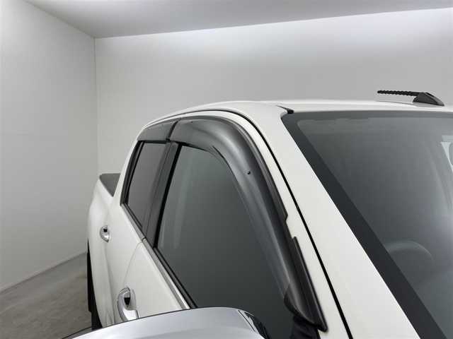 トヨタ ハイラックス Z 岡山県 2021(令3)年 5.1万km スーパーホワイトⅡ 純正ナビ　(NSZT-Y68T)/【CD/DVD/BT/SD/フルセグ】/4WD/ターボ/ＬＥＤヘッドライト　/ＥＴＣ　/バックカメラ　/クルーズコントロール　/ドライブレコーダー　前後/コーナーセンサー　前後/オートハイビーム　/ダウンヒルアシスト　/アイドリングストップ　/スペアキー×1/禁煙車/純正フロアマット/LEDフォグライト/センターデフロック/レーンアシスト