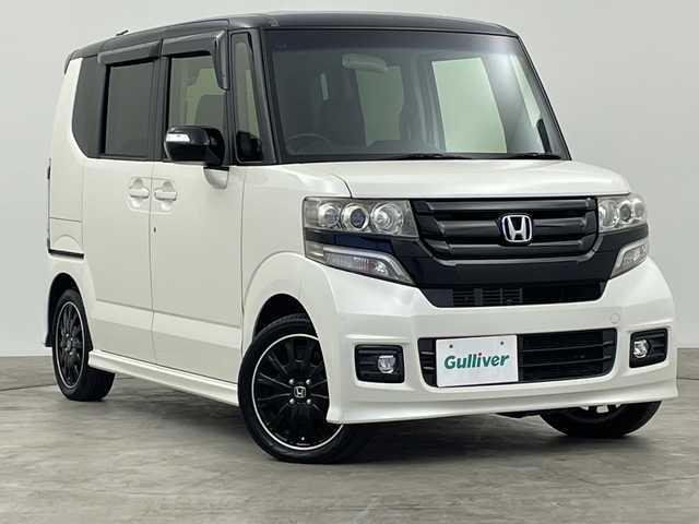 ホンダ Ｎ ＢＯＸ 2トーン カスタム G ターボLパッケージ 群馬県 2016(平28)年 4.8万km プレミアムホワイトパールⅡ 禁煙車　社外7インチナビ　バックカメラ　クルーズコントロール　両側パワースライドドア　HIDオートライト　ハーフレザーシート　純正15インチアルミホイール　ステアリングリモコン　パドルシフト　ETC