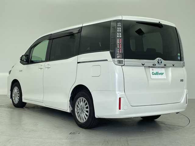 トヨタ ヴォクシー ハイブリッド V 愛知県 2014(平26)年 9.7万km ホワイトパールクリスタルシャイン 純正9型ナビ/・Bluetooth/・CD/DVD/・フルセグテレビ/純正フリップダウンモニター/衝突軽減ブレーキ/両側パワースライドドア/前後ドライブレコーダー/シートヒーター/LEDヘッドライト/アクセル踏み間違い防止/ETC