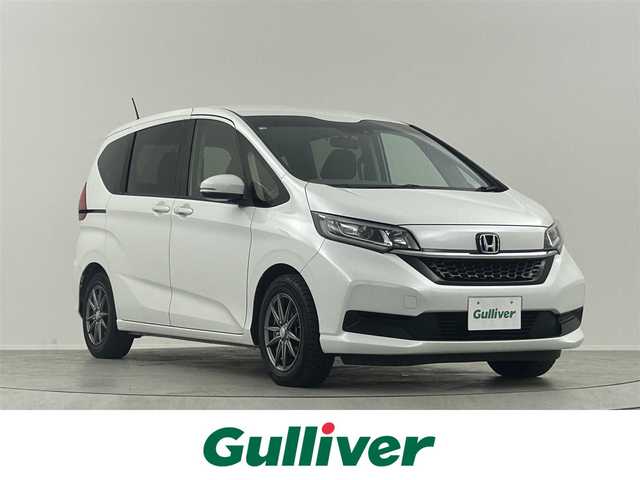 ホンダ フリード G ホンダセンシング 埼玉県 2020(令2)年 4.4万km プラチナホワイトパール 純正メモリナビ　Ｂｌｕｅｔｏｏｔｈ　ＣＤ　ＤＶＤ　フルセグ　ＵＳＢ　ホンダセンシング　前後ドラレコ　ＥＴＣ　両側パワースライドドア　ＬＥＤヘッドライト　アダプティブクルーズコントロール　オートライト　夏タイヤ積載