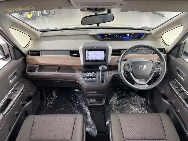 ホンダ フリード G ホンダセンシング 愛知県 2020(令2)年 4.4万km プラチナホワイトパール 禁煙車/純正7インチナビ/（CD/DVD/Bluetooth/フルセグTV/SD/AM/FM)/バックカメラ/ホンダセンシング/・衝突軽減ブレーキ/・レーダークルーズコントロール/・レーンキープアシスト/・オートマチックハイビーム/コーナーセンサー/前後ドライブレコーダー/ETC2.0/シートヒーター/両側パワースライドドア/15インチアルミホイール/純正フロアマット/スマートキー/プッシュスタート/LEDヘッドライト/
