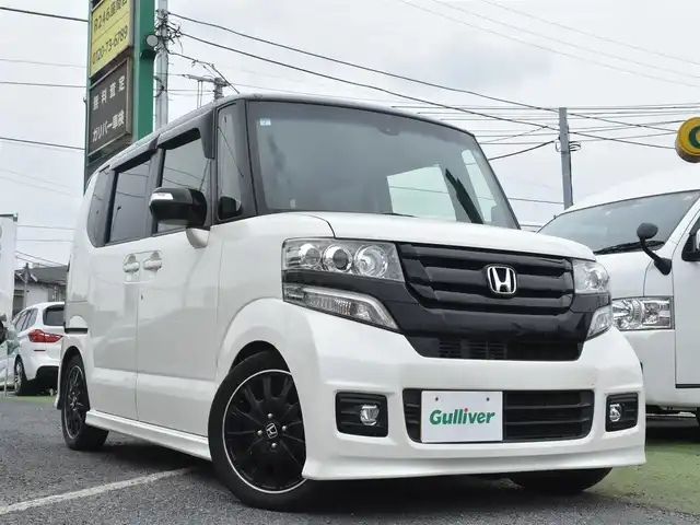 ホンダ Ｎ ＢＯＸ 2トーン カスタム G ターボLパッケージ 神奈川県 2015(平27)年 5万km プレミアムホワイトパールⅡ メモリナビAVN-Z04i/フルセグテレビ/Bluetoothオーディオ/DVD/CD/バックカメラ/両側パワースライドドア/RS-RダウンサスTi2000/4本出しマフラー/スマートキー/HIDヘッドライト/クルーズコントロール/シティブレーキシステム/アイドリングストップシステム/ETC/保証書/取扱説明書