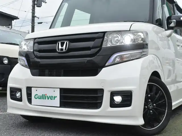 ホンダ Ｎ ＢＯＸ 2トーン カスタム G ターボLパッケージ 神奈川県 2015(平27)年 5万km プレミアムホワイトパールⅡ メモリナビAVN-Z04i/フルセグテレビ/Bluetoothオーディオ/DVD/CD/バックカメラ/両側パワースライドドア/RS-RダウンサスTi2000/4本出しマフラー/スマートキー/HIDヘッドライト/クルーズコントロール/シティブレーキシステム/アイドリングストップシステム/ETC/保証書/取扱説明書
