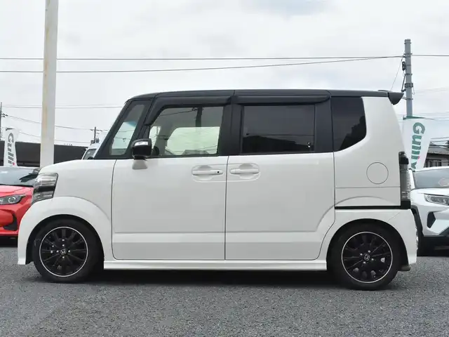 ホンダ Ｎ ＢＯＸ 2トーン カスタム G ターボLパッケージ 神奈川県 2015(平27)年 5万km プレミアムホワイトパールⅡ メモリナビAVN-Z04i/フルセグテレビ/Bluetoothオーディオ/DVD/CD/バックカメラ/両側パワースライドドア/RS-RダウンサスTi2000/4本出しマフラー/スマートキー/HIDヘッドライト/クルーズコントロール/シティブレーキシステム/アイドリングストップシステム/ETC/保証書/取扱説明書