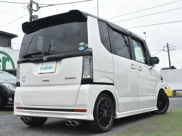 ホンダ Ｎ ＢＯＸ 2トーン カスタム G ターボLパッケージ 神奈川県 2015(平27)年 5万km プレミアムホワイトパールⅡ メモリナビAVN-Z04i/フルセグテレビ/Bluetoothオーディオ/DVD/CD/バックカメラ/両側パワースライドドア/RS-RダウンサスTi2000/4本出しマフラー/スマートキー/HIDヘッドライト/クルーズコントロール/シティブレーキシステム/アイドリングストップシステム/ETC/保証書/取扱説明書