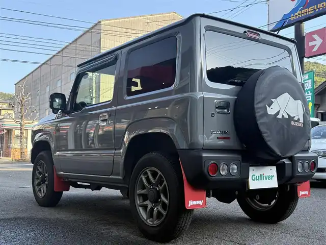 スズキ ジムニー XC 長崎県 2022(令4)年 1.7万km ミディアムグレー 衝突被害軽減ブレーキ/クルーズコントロール/レーンキープアシスト/ディーラーOP/メモリナビ【CN-RZ875】/・Bluetooth接続/・フルセグTV/・DVD再生/シートヒーター/革調シートカバー/ドライブレコーダー/ダウンヒルアシスト/LEDオートヘッドライト/ヘッドライトウォッシャー/ステアリングスイッチ/横すべり防止装置/アイドリングストップ/純正マッドガード/社外テールランプカバー