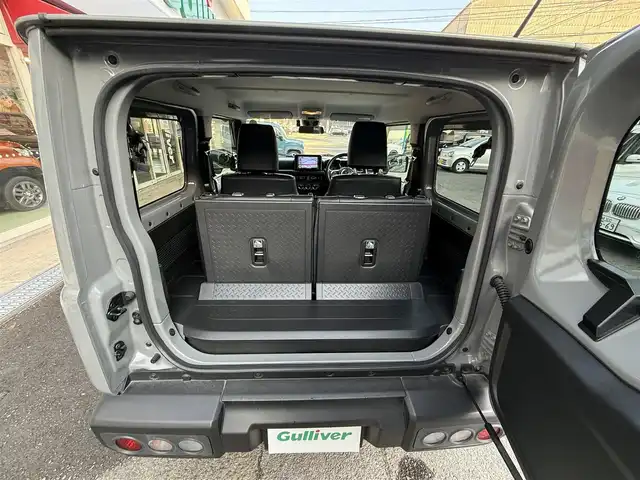 スズキ ジムニー XC 長崎県 2022(令4)年 1.7万km ミディアムグレー 衝突被害軽減ブレーキ/クルーズコントロール/レーンキープアシスト/ディーラーOP/メモリナビ【CN-RZ875】/・Bluetooth接続/・フルセグTV/・DVD再生/シートヒーター/革調シートカバー/ドライブレコーダー/ダウンヒルアシスト/LEDオートヘッドライト/ヘッドライトウォッシャー/ステアリングスイッチ/横すべり防止装置/アイドリングストップ/純正マッドガード/社外テールランプカバー