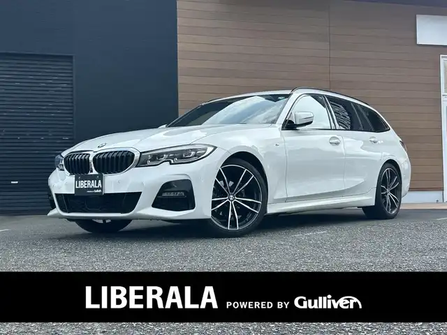ＢＭＷ ＢＭＷ ３１８ｉ ツーリング Mスポーツ 宮崎県 2021(令3)年 5.3万km 白 純正メモリナビ/・Bluetooth /・USB/・AM FM/・ワイヤレス充電/全方位カメラ/・フロント/・サイド/・バック/ブラックレザーシート/・DN席パワーシート/・DN席シートヒーター /ライブコックピット/ブラインドスポットモニター/インテリジェントセーフティ/アダプティブクルーズコントロール/・レーンキープ/ヘッドアップディスプレイ/前後ユピテルドライブレコーダー/ミラー一体型ETC/アンビエントライト/パドルシフト/LEDヘッドライト/・オートライト/・オートハイビーム/純正19インチアルミホイール