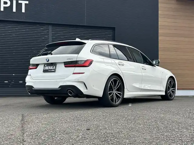 ＢＭＷ ＢＭＷ ３１８ｉ ツーリング Mスポーツ 宮崎県 2021(令3)年 5.3万km 白 純正メモリナビ/・Bluetooth /・USB/・AM FM/・ワイヤレス充電/全方位カメラ/・フロント/・サイド/・バック/ブラックレザーシート/・DN席パワーシート/・DN席シートヒーター /ライブコックピット/ブラインドスポットモニター/インテリジェントセーフティ/アダプティブクルーズコントロール/・レーンキープ/ヘッドアップディスプレイ/前後ユピテルドライブレコーダー/ミラー一体型ETC/アンビエントライト/パドルシフト/LEDヘッドライト/・オートライト/・オートハイビーム/純正19インチアルミホイール