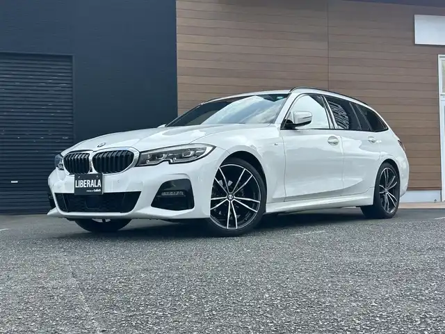 ＢＭＷ ＢＭＷ ３１８ｉ ツーリング Mスポーツ 宮崎県 2021(令3)年 5.3万km 白 純正メモリナビ/・Bluetooth /・USB/・AM FM/・ワイヤレス充電/全方位カメラ/・フロント/・サイド/・バック/ブラックレザーシート/・DN席パワーシート/・DN席シートヒーター /ライブコックピット/ブラインドスポットモニター/インテリジェントセーフティ/アダプティブクルーズコントロール/・レーンキープ/ヘッドアップディスプレイ/前後ユピテルドライブレコーダー/ミラー一体型ETC/アンビエントライト/パドルシフト/LEDヘッドライト/・オートライト/・オートハイビーム/純正19インチアルミホイール