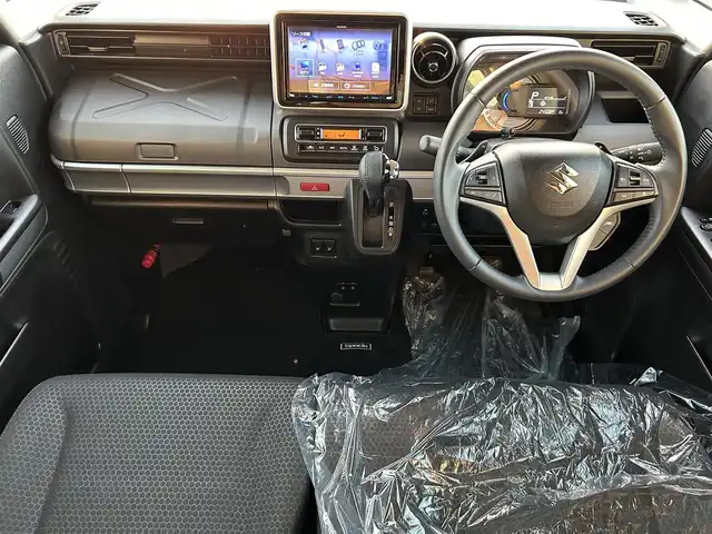 スズキ スペーシア ギア HYBRID XZターボ 愛媛県 2022(令4)年 2.5万km オフブルーメタリック/ガンメタリック2トーンルーフ ワンオーナー/純正ナビ（Bluetooth/フルセグTV）/両側パワースライドドア/ヘッドアップディスプレイ/バックカメラ/アダプティブクルーズコントロール/シートヒーター/純正フロアマット/純正14インチアルミホイール/パドルシフト/ステアリングリモコン/後席用テーブル/ルーフレール/リアセンサー/LEDヘッドライト/スマートキー