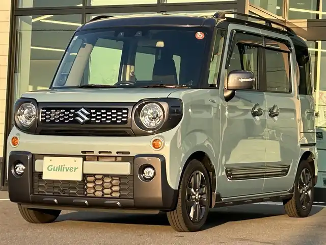 スズキ スペーシア ギア HYBRID XZターボ 愛媛県 2022(令4)年 2.5万km オフブルーメタリック/ガンメタリック2トーンルーフ ワンオーナー/純正ナビ（Bluetooth/フルセグTV）/両側パワースライドドア/ヘッドアップディスプレイ/バックカメラ/アダプティブクルーズコントロール/シートヒーター/純正フロアマット/純正14インチアルミホイール/パドルシフト/ステアリングリモコン/後席用テーブル/ルーフレール/リアセンサー/LEDヘッドライト/スマートキー
