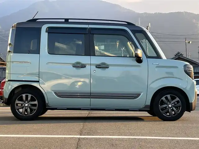 スズキ スペーシア ギア HYBRID XZターボ 愛媛県 2022(令4)年 2.5万km オフブルーメタリック/ガンメタリック2トーンルーフ ワンオーナー/純正ナビ（Bluetooth/フルセグTV）/両側パワースライドドア/ヘッドアップディスプレイ/バックカメラ/アダプティブクルーズコントロール/シートヒーター/純正フロアマット/純正14インチアルミホイール/パドルシフト/ステアリングリモコン/後席用テーブル/ルーフレール/リアセンサー/LEDヘッドライト/スマートキー