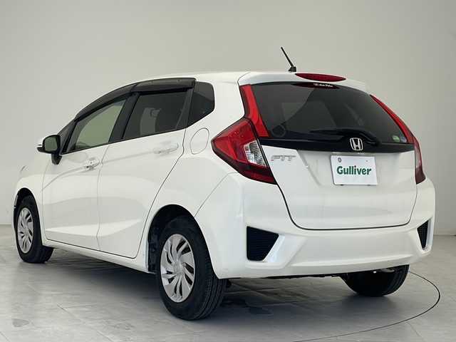 ホンダ フィット 13G Fパッケージ 沖縄県 2015(平27)年 7.4万km プレミアムホワイトパール 社外ナビ　【AVIC-RZ802】/　(ＴＶ　Ｂｌｕｅｔｏｏｔｈ　ＣＤ／ＤＶＤ)　/プッシュスタート　/スマートキー/スペアキー　/アイドリングストップ　/純正フロアマット　/ＥＴＣ　/横滑り防止機能　/パワーステアリング　/パワーウィンドウ　/ドアバイザー