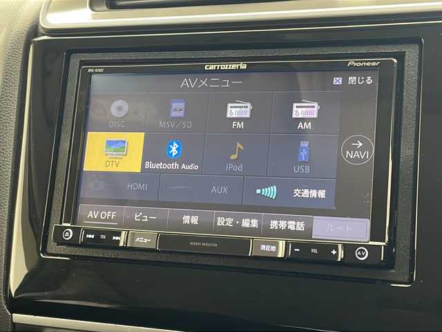 ホンダ フィット 13G Fパッケージ 沖縄県 2015(平27)年 7.4万km プレミアムホワイトパール 社外ナビ　【AVIC-RZ802】/　(ＴＶ　Ｂｌｕｅｔｏｏｔｈ　ＣＤ／ＤＶＤ)　/プッシュスタート　/スマートキー/スペアキー　/アイドリングストップ　/純正フロアマット　/ＥＴＣ　/横滑り防止機能　/パワーステアリング　/パワーウィンドウ　/ドアバイザー