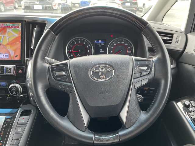 トヨタ ヴェルファイア Z Gエディション 茨城県 2018(平30)年 6.4万km ブラック ・社外アルパインナビ/（フルセグTV　BT CD DVD）/・アルパイン製フリップダウンモニター/・バックカメラ/・前席パワーシート/・前席シートヒーター ベンチレーション/・両側パワースライドドア/・パワーバックドア/・衝突被害軽減ブレーキ/・レーダークルーズコントロール/・レーンアシスト/・オートマチックハイビーム/・Wサンルーフ/・黒革シート/・ドラレコ/・ビルトインETC/・ステアリングヒーター/・コーナーセンサー/・スペアキー有