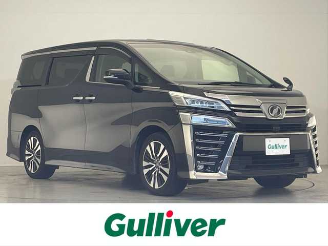 トヨタ ヴェルファイア Z Gエディション 滋賀県 2018(平30)年 6.4万km ブラック 禁煙車/ツインムーンルーフ/ALPINE９型ナビ/ALPINEフリップダウンモニター/ALPINE前後ドラレコ（DVR-C02R）/ALPINEカーアロマ/バックカメラ/ビルトインＥＴＣ/３眼ＬＥＤライト/トヨタセーフティセンス/・プリクラッシュセーフティ/・レーントレーシングアシスト/・ロードサインアシスト/・レーダークルーズコントロール/・オートマチックハイビーム/エグゼクティブパワーシート/パワーオットマン/パワーバックドア/ステアリングヒーター/シートヒーター/シートベンチレーション/ステアリングスイッチ/オートホールド