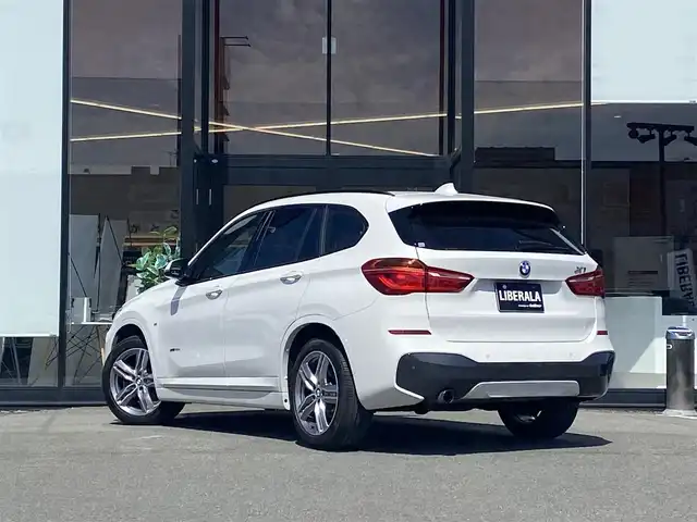 ＢＭＷ Ｘ１ xDrive 18d Mスポーツ 福岡県 2017(平29)年 5.9万km アルピンホワイトⅢ ・サンルーフ/・クルーズコントロール/・純正HDDナビ/USB/Bluetooth/CD/AUX/・黒革シート/シートヒーター/・前後ドライブレコーダー/・フルセグ/・ETC/・純正18AW/・プッシュスタート/・パーキングアシスト/・アイドリングストップ/・スマートキー/・パワーシート/・オートライト/・LEDライト/・保証書/・取扱説明書/・記録簿