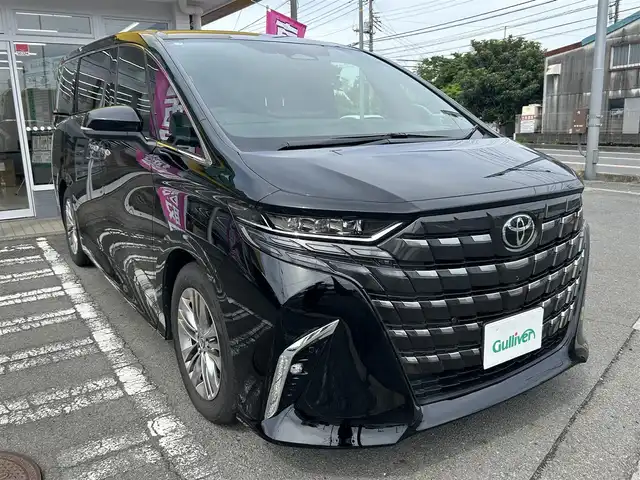 トヨタ アルファード Z 神奈川県 2025(令7)年 0.1万km ブラック ・純正ナビ（BT/USB/フルセグ）/・全方位カメラ/・両側電動スライドドア/・デジタルインナーミラー/・レーダークルーズコントロール/・パワーバックドア/・後席パワーシート・ヒーター・クーラー/・オットマン/・LEDヘッドライト/・横滑り防止装置/・レーンキープアシスト/・衝突軽減システム/・コーナーセンサー/・ガラスルーフ/・オートマチックハイビーム/・ETC2.0/・スマートキーｘ２/・WAC/・保証書