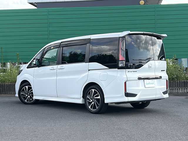 ホンダ ステップワゴン スパーダ クルスピセンシング 茨城県 2017(平29)年 6.9万km プラチナホワイトパール HONDA SENSING/-衝突軽減ブレーキ/-誤発進抑制機能/-歩行者事故低減ステアリング/-アダプティブクルーズコントロール/-車線維持支援システム/-路外逸脱抑制機能/-先行車発信お知らせ機能/-標識認識機能/-フロントセンサーカメラ/-レーダーセンサー/後席10.2V型フリップダウンモニター/社外７インチＳＤナビ/-Ｂｌｕｅｔｏｏｔｈ/Blu-ray/フルセグ/ＣＤ/DVD/バックカメラ/LEDオートライト/オートハイビーム/DN席シートヒーター/純正１７インチアルミホイール/パドルシフト/ビルトインETC