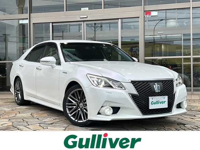 トヨタ クラウン ハイブリッド アスリートG 静岡県 2014(平26)年 10.4万km ホワイトパールクリスタルシャイン 純正マルチ/・ナビゲーション/・フルセグTV/・HDD記録/・FM/AM/・CD/DVD/・USB/・Bluetooth/主要装備/・バックカメラ/・ＥＴＣ/・クリアランスソナー/・シートヒーター＆ベンチレーション/・前席パワーシート/・追従クルコン/・ハンドルヒーター/・黒革/・プリクラッシュセーフティ/・１８インチアルミ/・オートライト/・フォグランプ/・サイドカーテンエアバッグ/・ＭＴモード付ＡＴ/・キセノンヘッドライト/・電動チルト＆テレスコピックステアリング