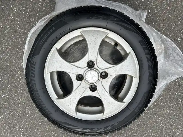 スズキ ワゴンＲ スティングレー T 青森県 2009(平21)年 9.4万km スパークブラックパール ４WD/MDチェンジャー/（FM／AM／CD〉/ステアリングスイッチ/パドルシフト/シートヒーター（運転席）/ドアバイザー/電動格納自動ミラー/フォグライト/社外スタッドレスタイヤ/保証書/取り扱い説明書