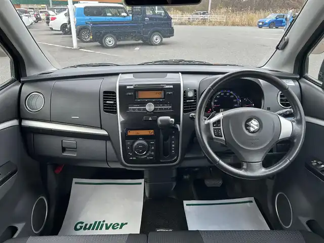 スズキ ワゴンＲ スティングレー T 青森県 2009(平21)年 9.4万km スパークブラックパール ４WD/MDチェンジャー/（FM／AM／CD〉/ステアリングスイッチ/パドルシフト/シートヒーター（運転席）/ドアバイザー/電動格納自動ミラー/フォグライト/社外スタッドレスタイヤ/保証書/取り扱い説明書