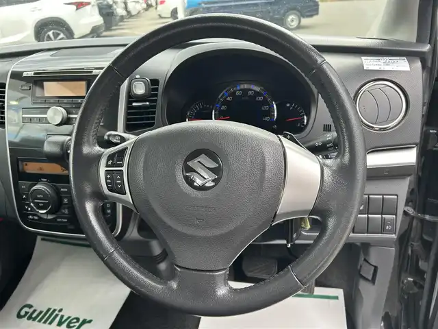 スズキ ワゴンＲ スティングレー T 青森県 2009(平21)年 9.4万km スパークブラックパール ４WD/MDチェンジャー/（FM／AM／CD〉/ステアリングスイッチ/パドルシフト/シートヒーター（運転席）/ドアバイザー/電動格納自動ミラー/フォグライト/社外スタッドレスタイヤ/保証書/取り扱い説明書