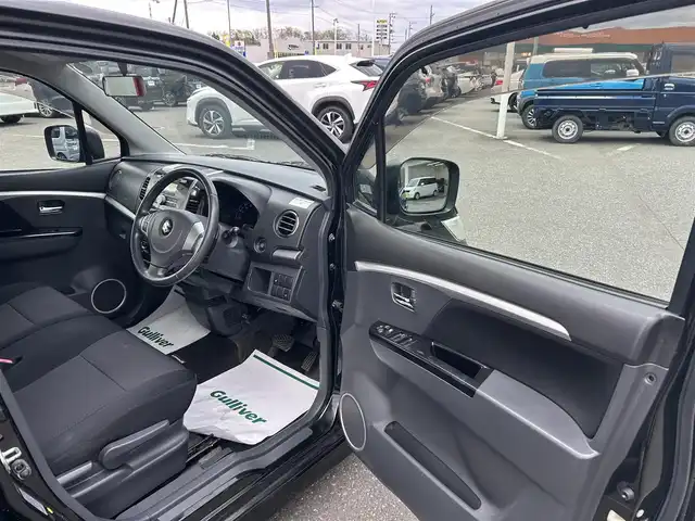 スズキ ワゴンＲ スティングレー T 青森県 2009(平21)年 9.4万km スパークブラックパール ４WD/MDチェンジャー/（FM／AM／CD〉/ステアリングスイッチ/パドルシフト/シートヒーター（運転席）/ドアバイザー/電動格納自動ミラー/フォグライト/社外スタッドレスタイヤ/保証書/取り扱い説明書